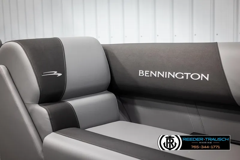 Slide: The Image of 2025 Bennington 21 SLSE boat interior with branded seating, gray and black upholstery. - 35