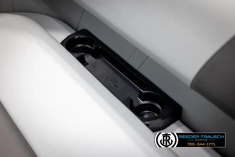 Slide: The Image of 2025 Bennington 21 SLSE boat cup holders and storage compartment. - 40
