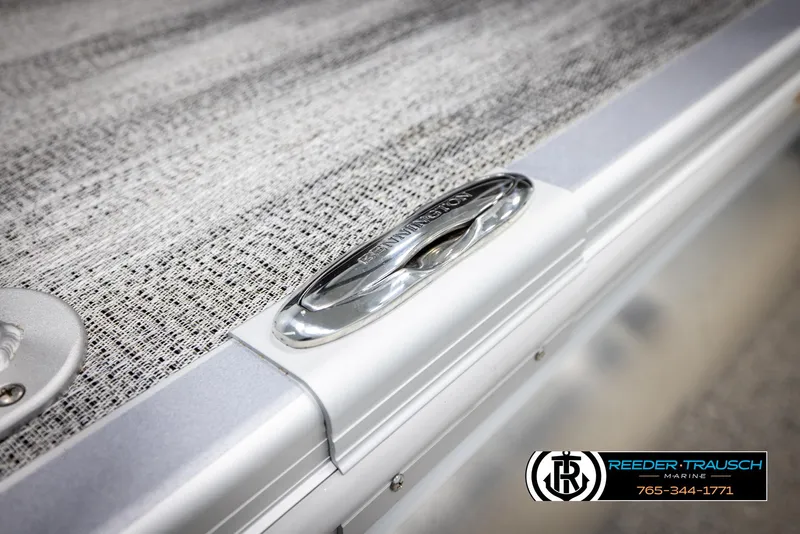 Slide: The Image of 2025 Bennington 21 SLSE boat detail with sleek silver finish and textured surface. - 47