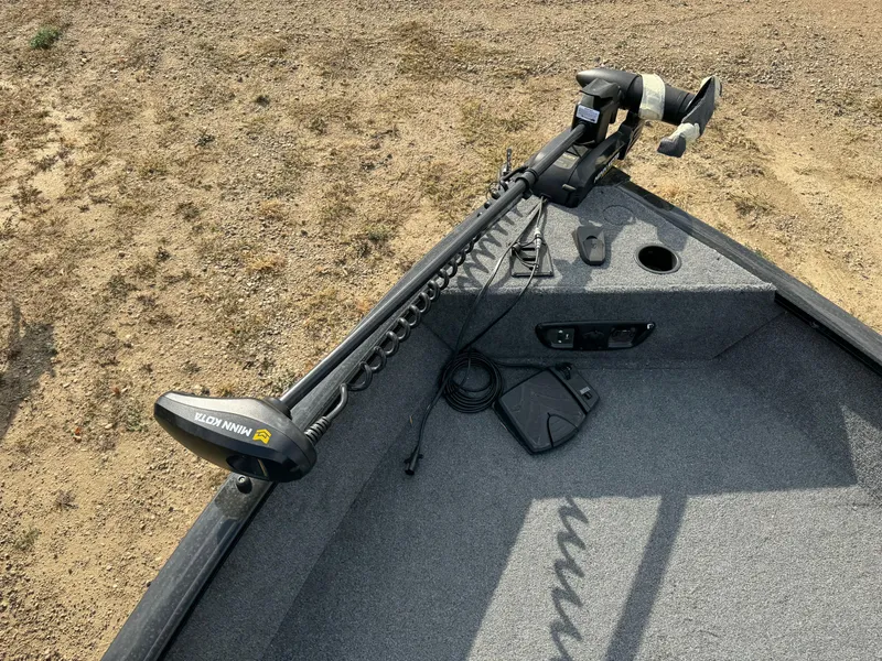 Slide: The Image of 2022 Tracker Pro Guide V-175 WT boat with trolling motor on deck. - 13