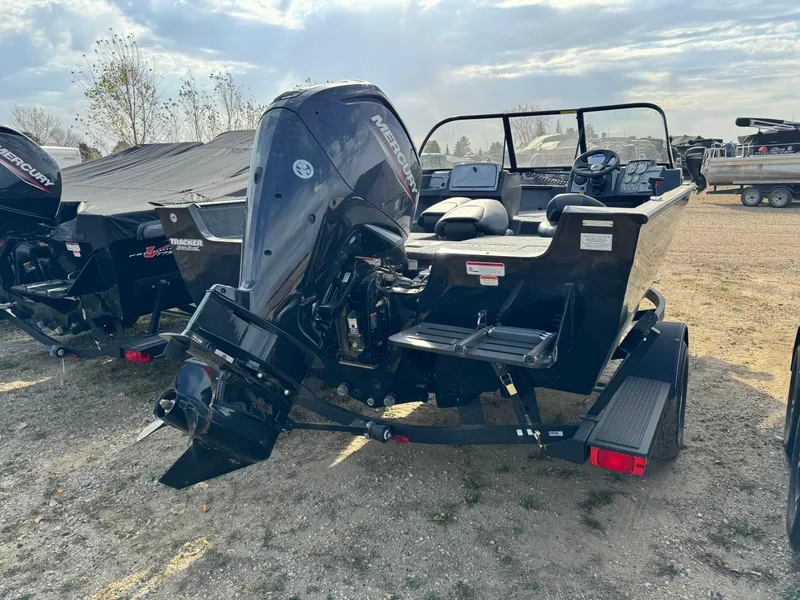 Slide: The Image of 2022 Tracker Pro Guide V-175 WT boat with Mercury outboard motor on trailer. - 3