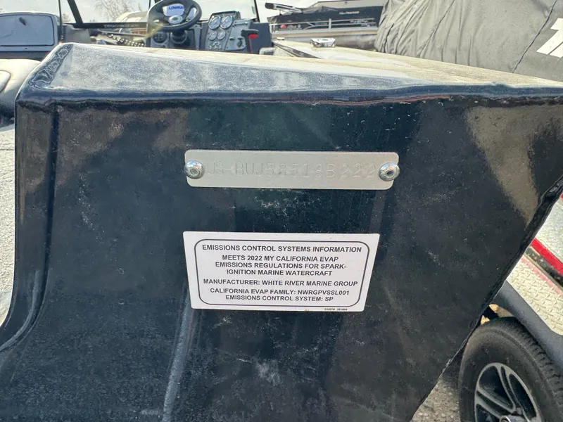 Slide: The Image of 2022 Tracker Pro Guide V-175 WT boat with emissions control information label. - 5