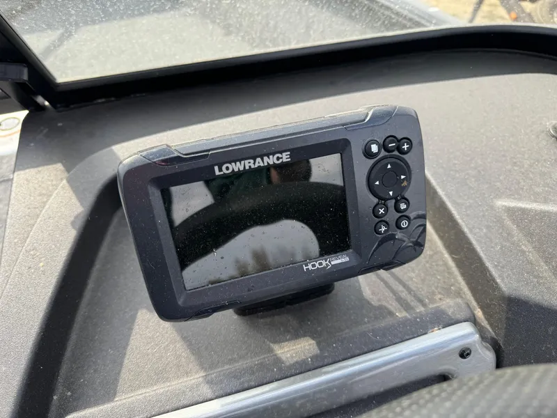 Slide: The Image of Lowrance HOOK Reveal fish finder on 2022 Tracker Pro Guide V-175 WT dashboard. - 9