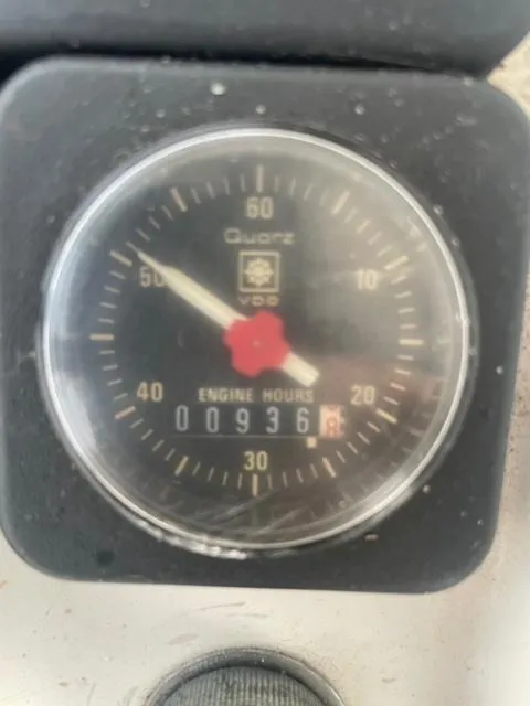 Slide: The Image of Close-up of 1989 Luhrs 320 Tournament engine hour meter showing 936 hours. - 18