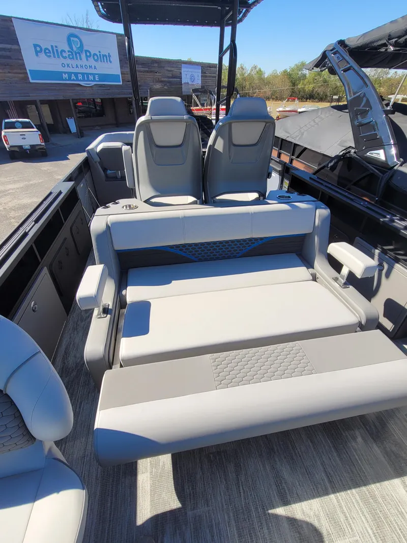 Slide: The Image of 2025 Quest M-8524 Angler Series boat interior with comfortable seating at Pelican Point Marina. - 12