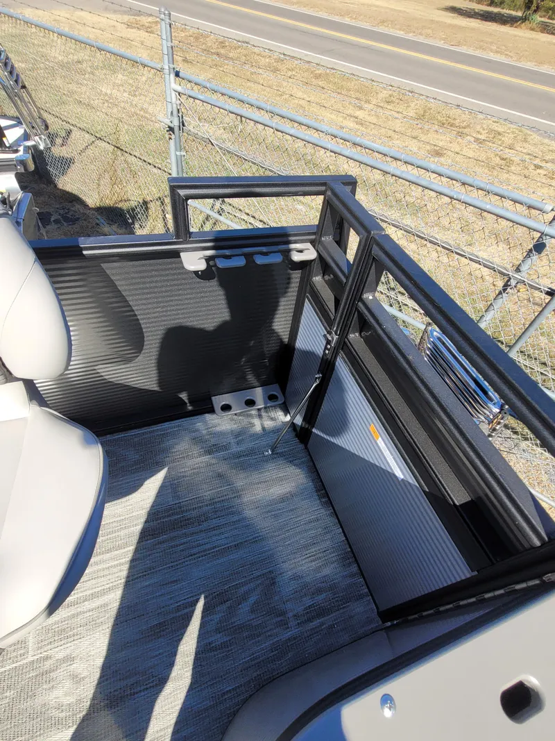 Slide: The Image of 2025 Quest M-8524 Angler Series boat interior with seating and railing. - 16