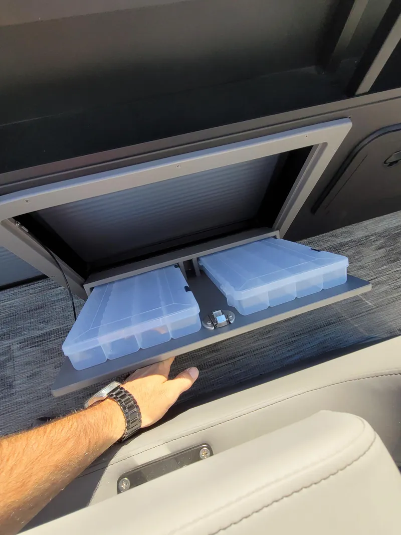 Slide: The Image of Storage compartment with tackle boxes in 2025 Quest M-8524 Angler Series boat. - 20