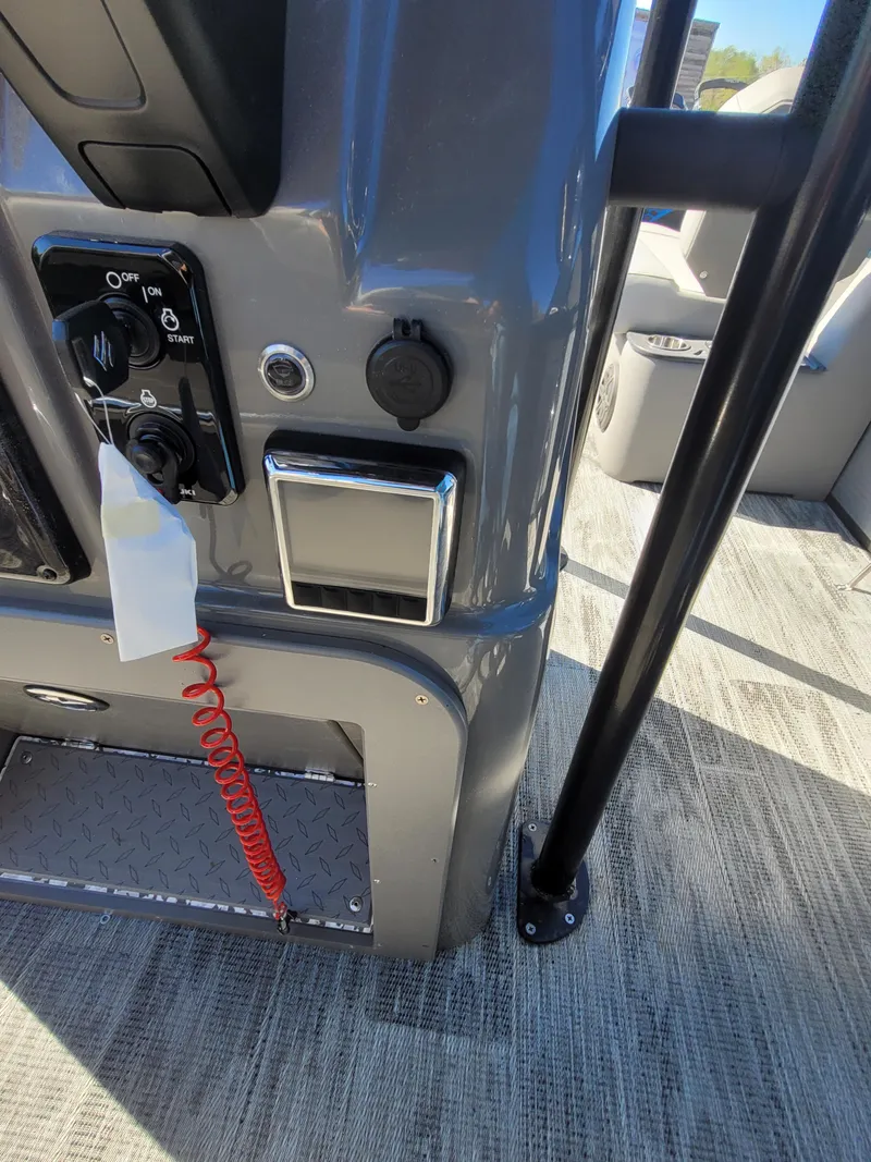 Slide: The Image of Control panel of 2025 Quest M-8524 Angler Series boat with safety features. - 26