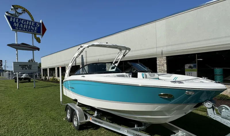 Slide: The Image of 2025 Regal LS2 boat on trailer at Hughes Marine Service. - 3