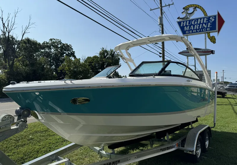 Slide: The Image of 2025 Regal LS2 boat on trailer at Hughes Marine Service. - 6