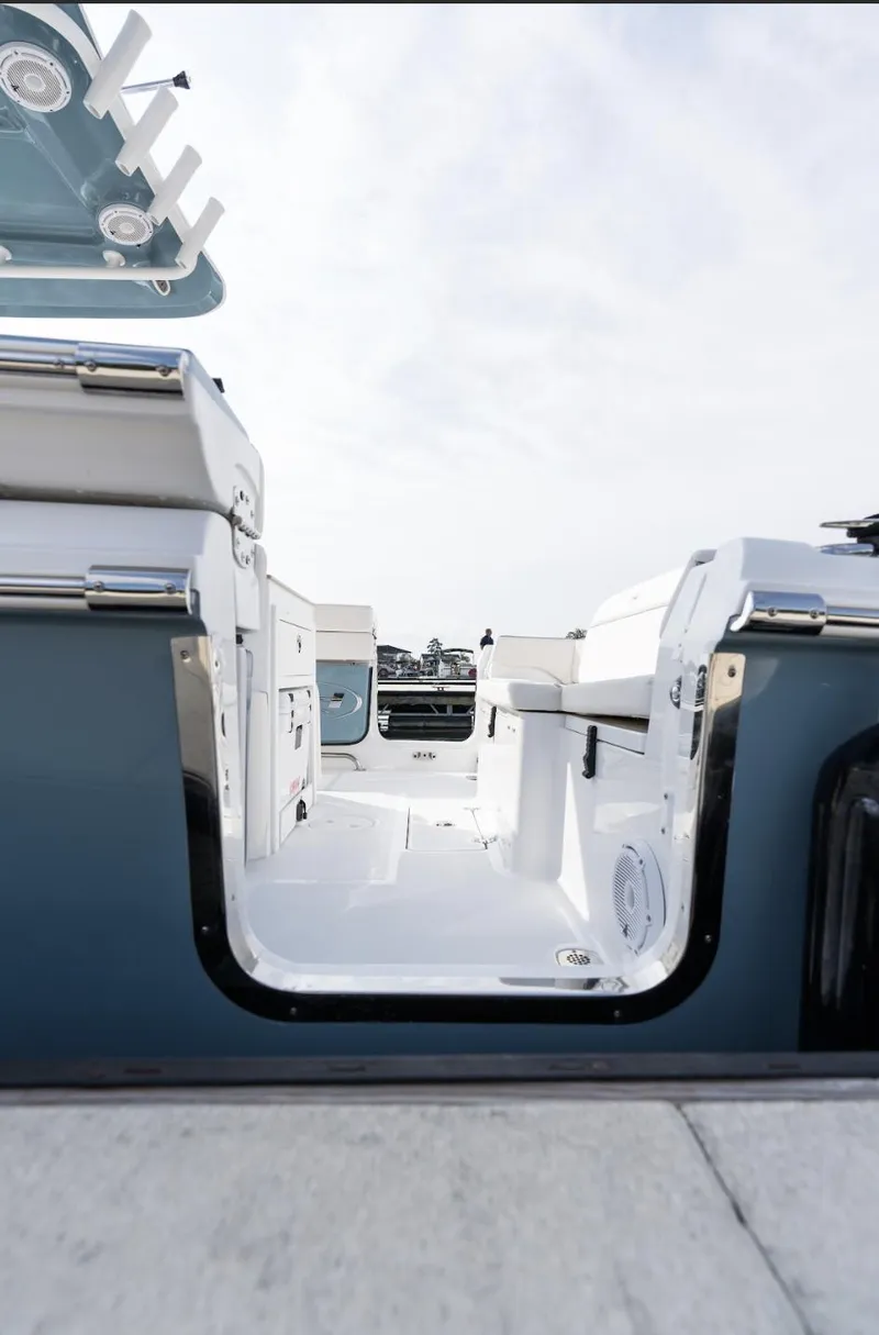 Slide: The Image of 2025 Sea Hunt Ultra 275 SE boat interior with sleek seating and modern design. - 35