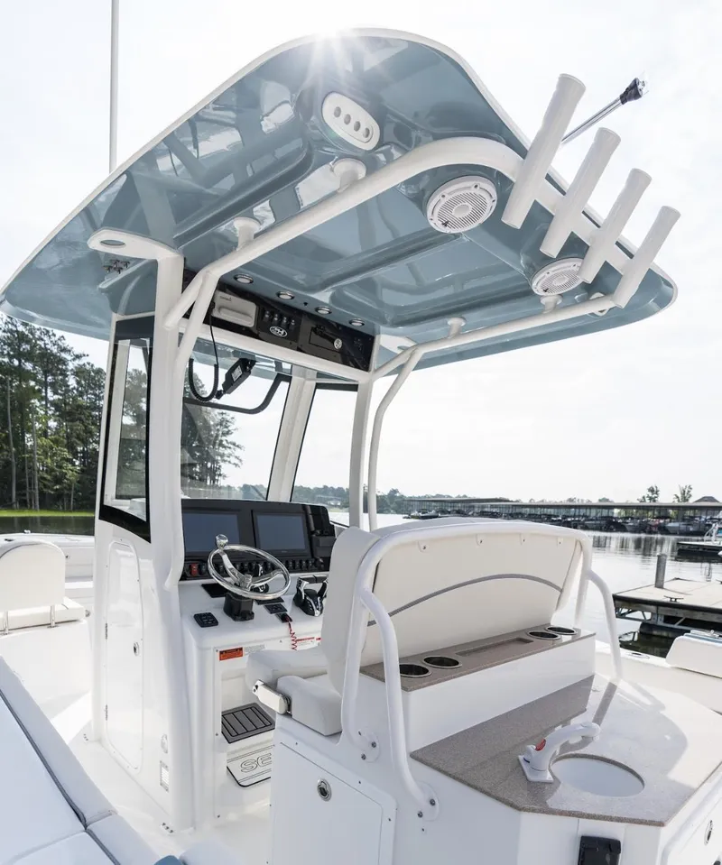 Slide: The Image of 2025 Sea Hunt Ultra 275 SE boat console with advanced navigation and fishing equipment. - 48