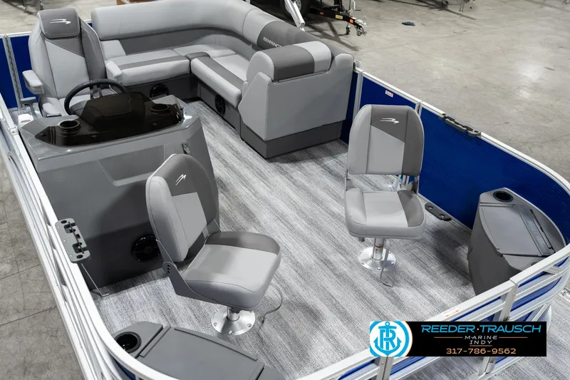 Slide: The Image of 2025 Bennington 168SF pontoon boat interior with gray seating and steering console. - 10