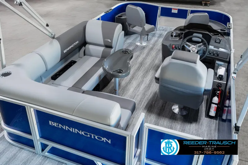 Slide: The Image of 2025 Bennington 168SF pontoon boat interior with gray seating and steering console. - 11