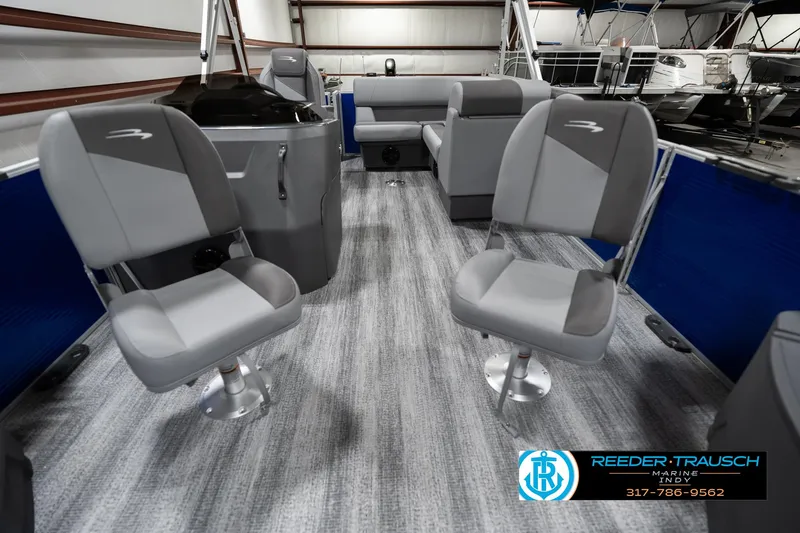 Slide: The Image of 2025 Bennington 168SF boat interior with gray seating and modern design. - 13