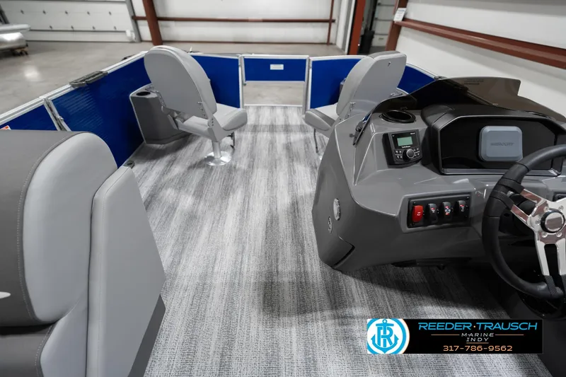 Slide: The Image of 2025 Bennington 168SF boat interior with modern seating and control panel. - 17