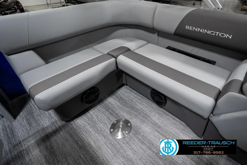 Slide: The Image of 2025 Bennington 168SF boat interior with gray seating and carpeted flooring. - 22