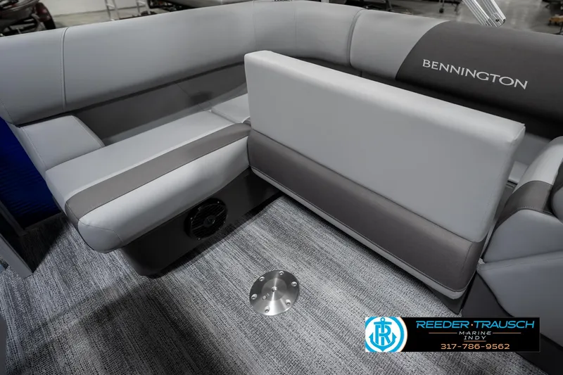 Slide: The Image of 2025 Bennington 168SF boat interior with gray seating and carpeted flooring. - 25
