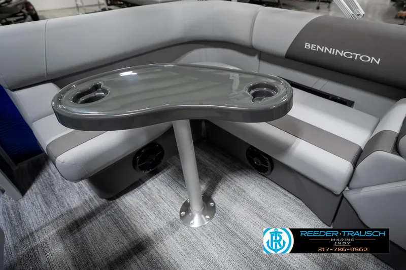 Slide: The Image of 2025 Bennington 168SF boat interior with gray seating and table. - 26