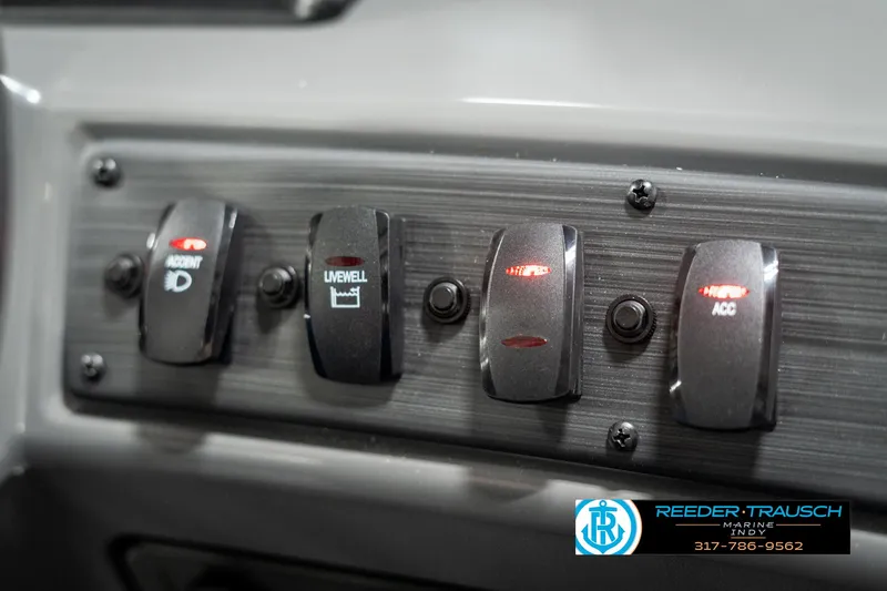 Slide: The Image of Dashboard switches of 2025 Bennington 168SF boat, featuring accent, livewell, and accessory controls. - 36