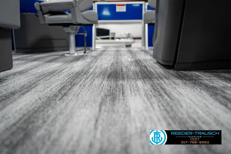 Slide: The Image of Interior view of 2025 Bennington 168SF boat with modern seating and flooring. - 42