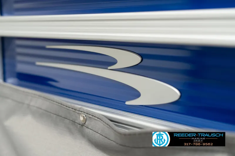 Slide: The Image of 2025 Bennington 168SF boat detail with logo and blue paneling. - 44