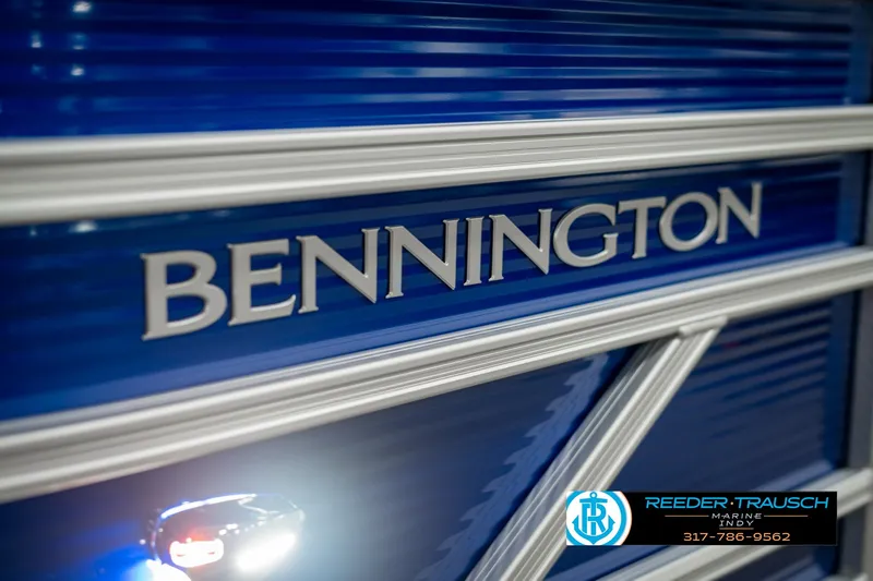 Slide: The Image of 2025 Bennington 168SF boat with blue exterior and Reeder-Trausch Marine logo. - 45