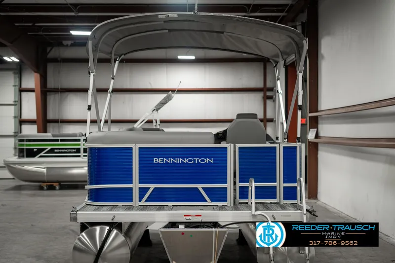 Slide: The Image of 2025 Bennington 168SF pontoon boat in showroom with canopy. - 7