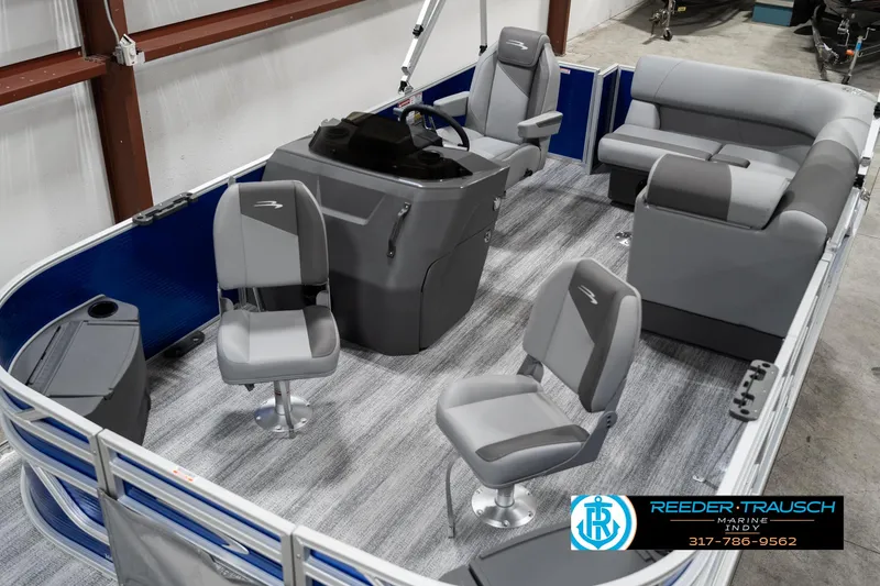 Slide: The Image of 2025 Bennington 168SF pontoon boat interior with gray seating and modern console. - 9
