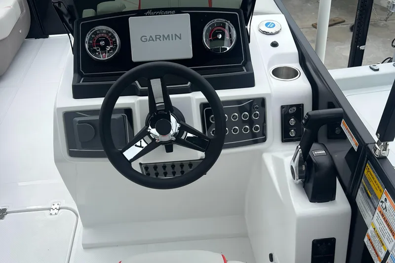 Slide: The Image of 2025 Hurricane FunDeck 2360 SFL OB boat dashboard with Garmin navigation system. - 10