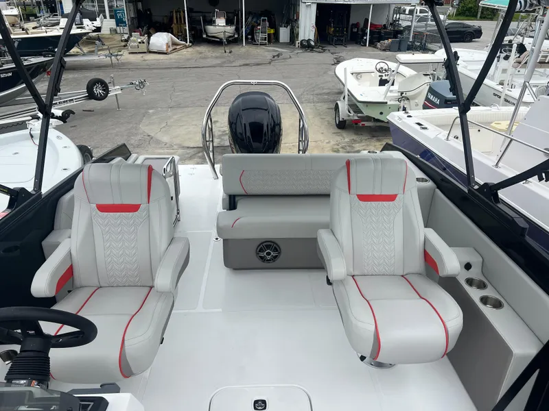Slide: The Image of 2025 Hurricane FunDeck 2360 SFL OB boat interior with stylish seating and modern design. - 3
