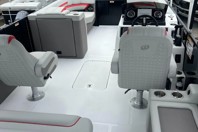 Slide: The Image of 2025 Hurricane FunDeck 2360 SFL OB interior with modern seating and dashboard. - 5