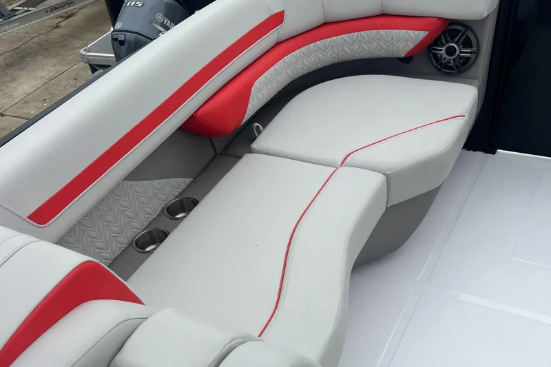 Slide: The Image of 2025 Hurricane FunDeck 2360 SFL OB boat interior with red and white seating. - 6