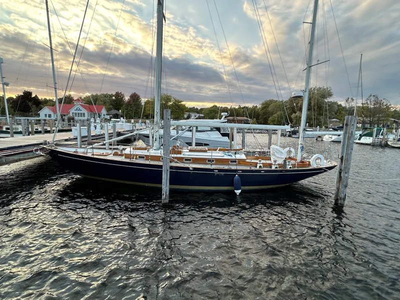 Slide: The Image of Sailboat docked at marina, Sparkman & Stephens S&S 45, 2010 model, under a cloudy sky. - 24