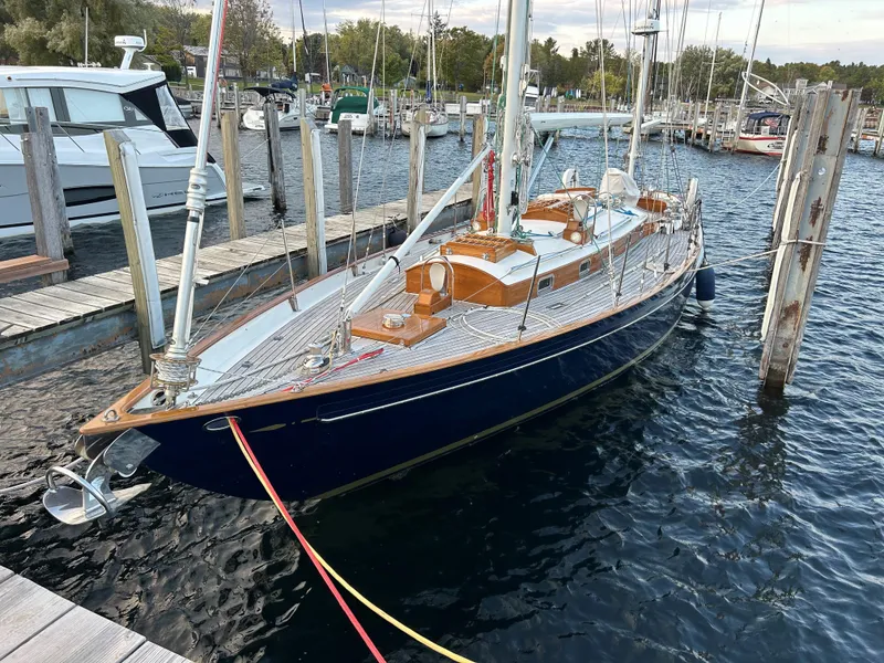 Slide: The Image of Sleek 2010 Sparkman & Stephens S&S 45 yacht docked in a marina. - 25