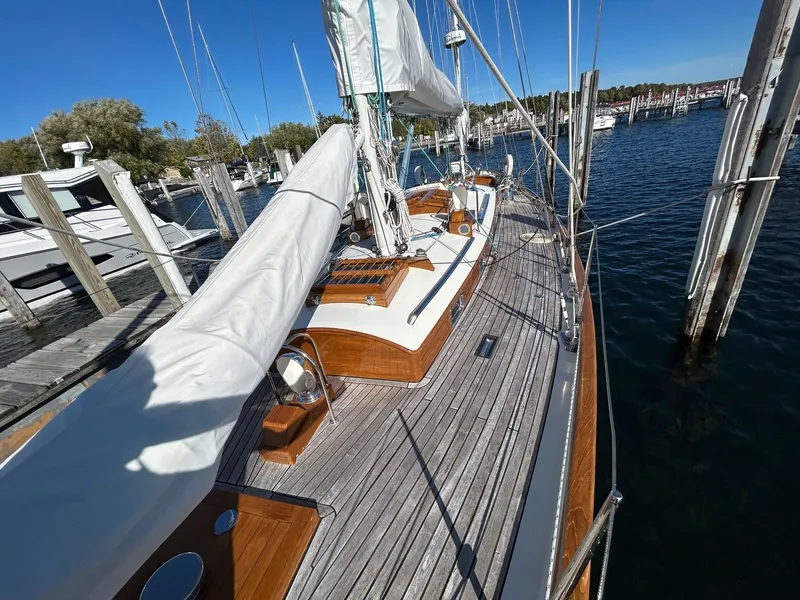 Slide: The Image of Sailboat docked at marina, Sparkman & Stephens S&S 45, 2010 model, wooden deck, clear sky. - 31