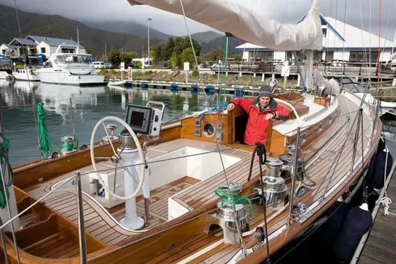 Slide: The Image of Sailing yacht Sparkman & Stephens S&S 45, 2010 model, docked with person on deck. - 32