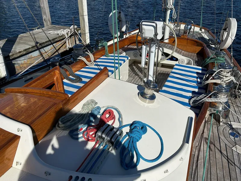Slide: The Image of Sailing yacht Sparkman & Stephens S&S 45, 2010 model, with striped seating and nautical ropes. - 36