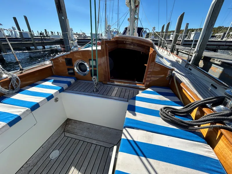 Slide: The Image of Sailboat cockpit with striped cushions, Sparkman & Stephens S&S 45, 2010 model. - 44