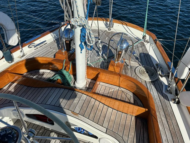 Slide: The Image of Deck of 2010 Sparkman & Stephens S&S 45 sailboat with wooden accents and rigging. - 46