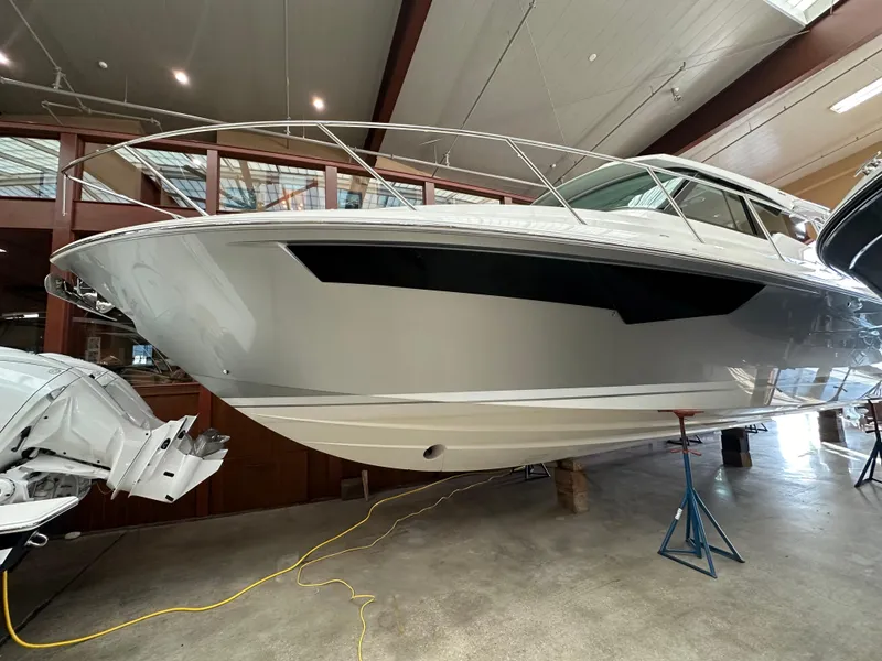 The Image of 2022 Tiara Yachts 43 LE in a showroom, sleek design and modern features. - 0