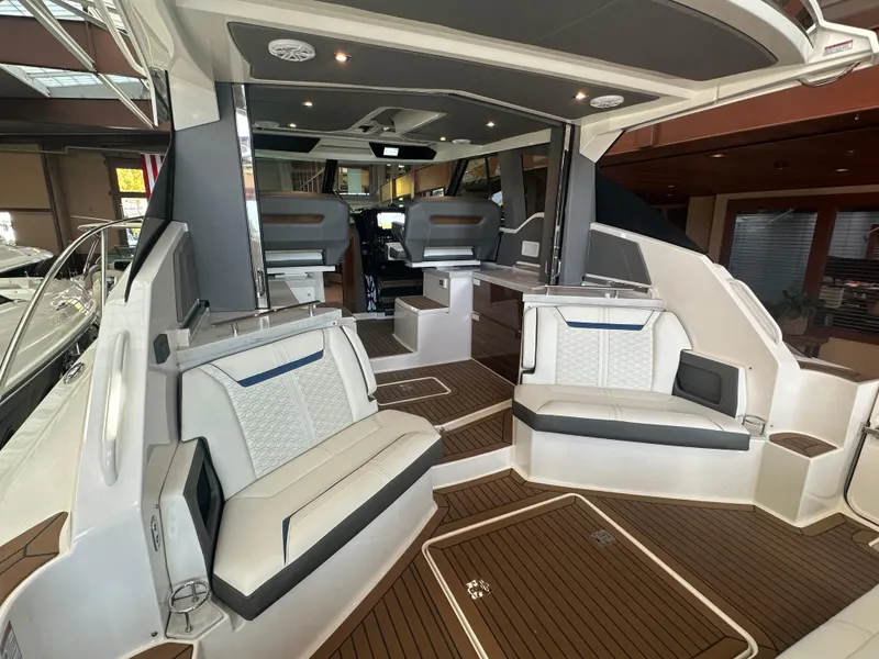 Slide: The Image of 2022 Tiara Yachts 43 LE interior with luxurious seating and modern design. - 10
