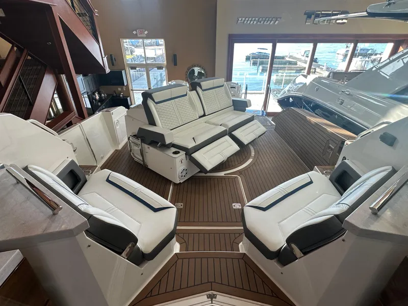 Slide: The Image of 2022 Tiara Yachts 43 LE interior with luxurious seating and elegant design. - 13