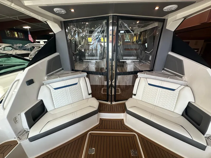 Slide: The Image of 2022 Tiara Yachts 43 LE interior with luxurious seating and sleek design. - 15