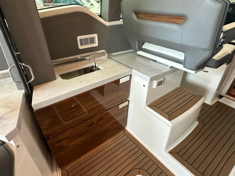 Slide: The Image of 2022 Tiara Yachts 43 LE interior with sleek cabinetry and modern design. - 16