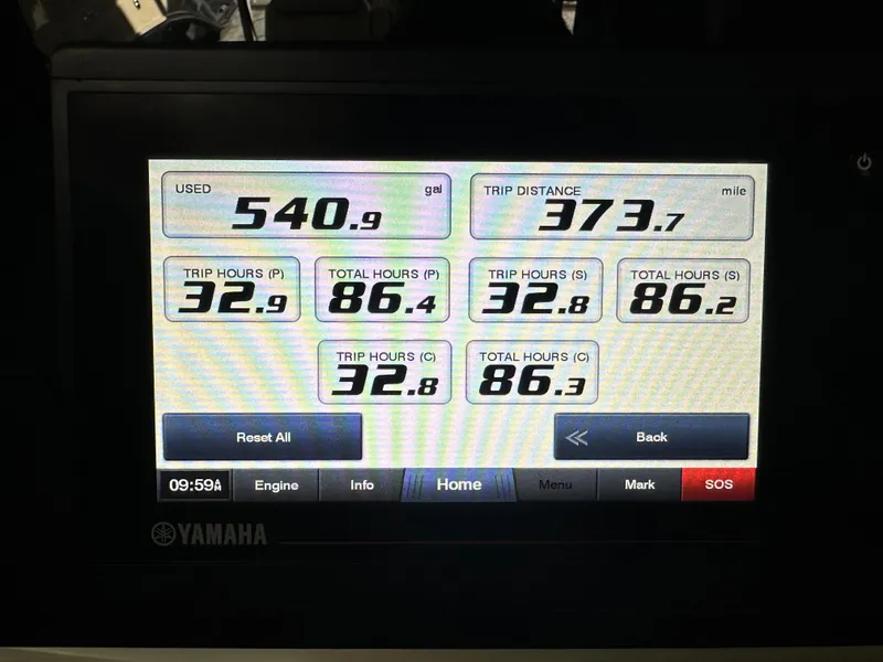 Slide: The Image of Yamaha display showing fuel usage and trip data for 2022 Tiara Yachts 43 LE. - 22