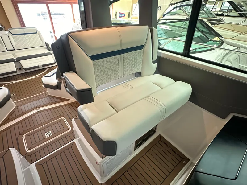 Slide: The Image of Luxurious interior seating of 2022 Tiara Yachts 43 LE with elegant design and wood flooring. - 25
