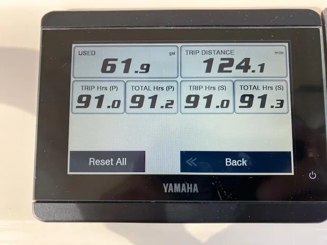 Slide: The Image of Yamaha display showing fuel usage and trip data for 2021 Scout 277 LXF boat. - 17