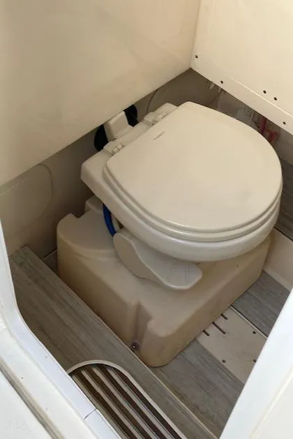 Slide: The Image of 2021 Scout 277 LXF boat toilet with compact design and modern features. - 28