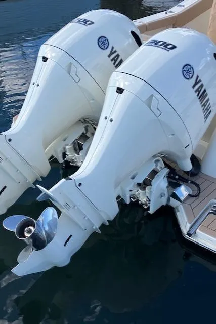 Slide: The Image of 2021 Scout 277 LXF with twin Yamaha 400 outboard engines. - 29